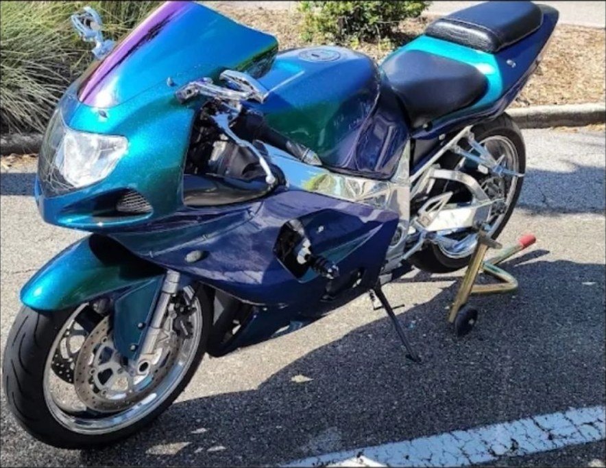 A blue and green sportsbike